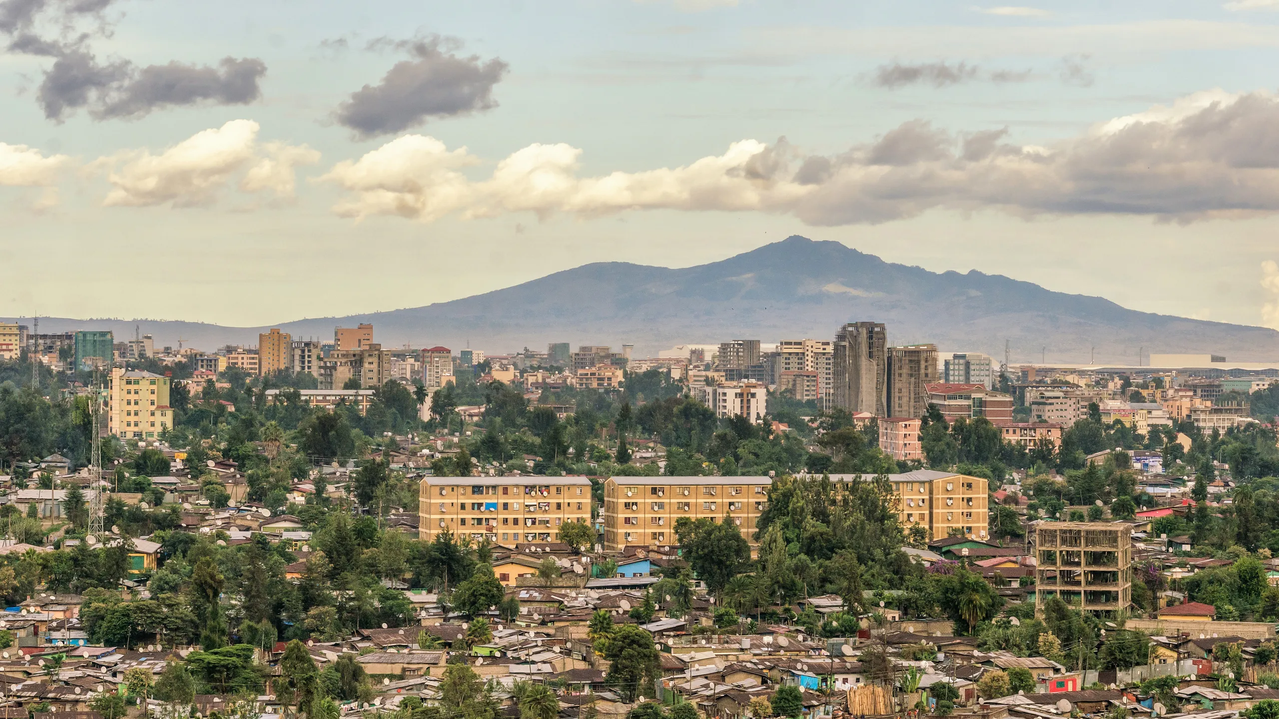 Addis Ababa cityscape in the Ethiopian highlands with Entoto hills in the background