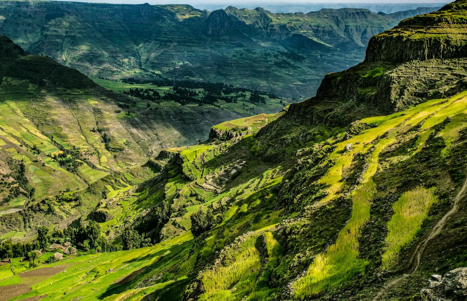 Rock-hewn church of Bete Giyorgis at Lalibela carved into red volcanic rock at sunrise, Ethiopia