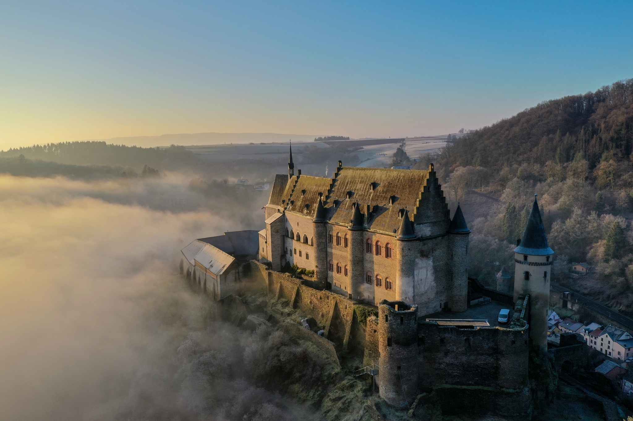 Vianden Castle perched above the Our River valley, Luxembourg