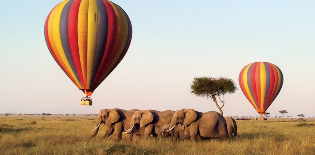 Hot air balloon over the Mara at sunrise