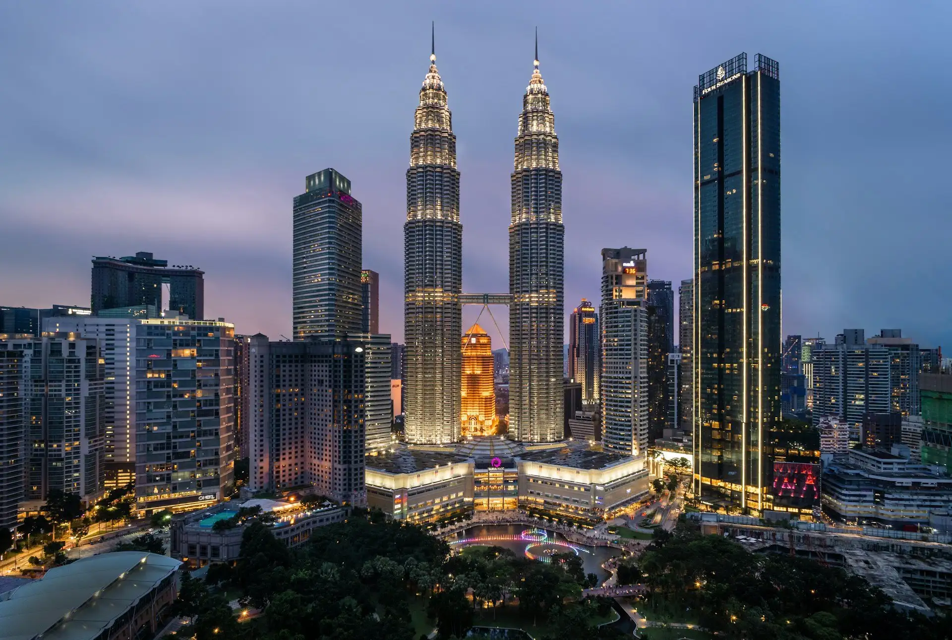 Petronas Twin Towers above Kuala Lumpur at dusk