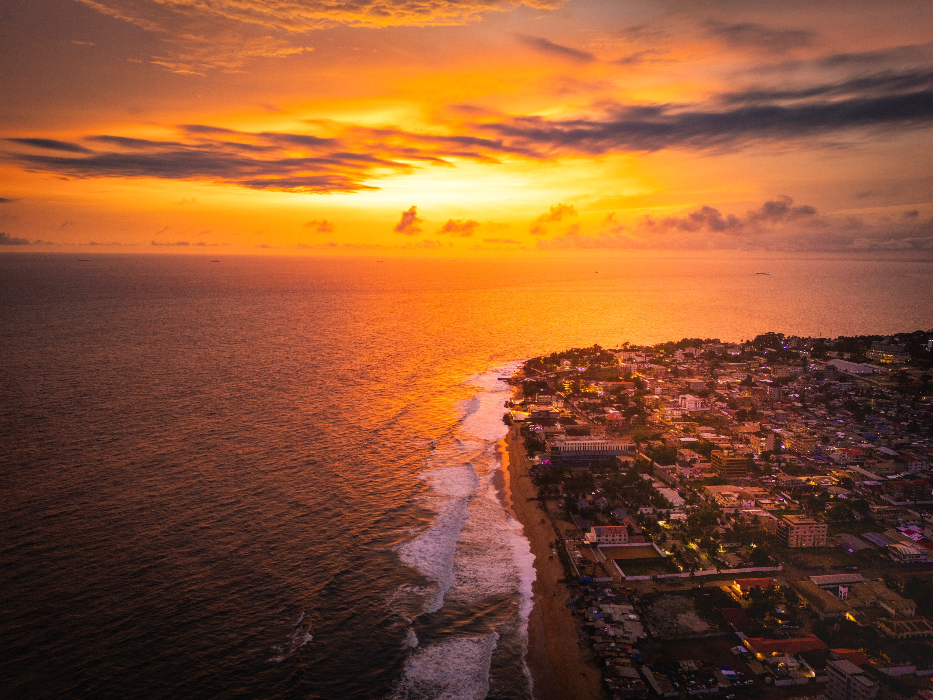 Monrovia's Mamba Point coastline with the Atlantic Ocean at golden hour