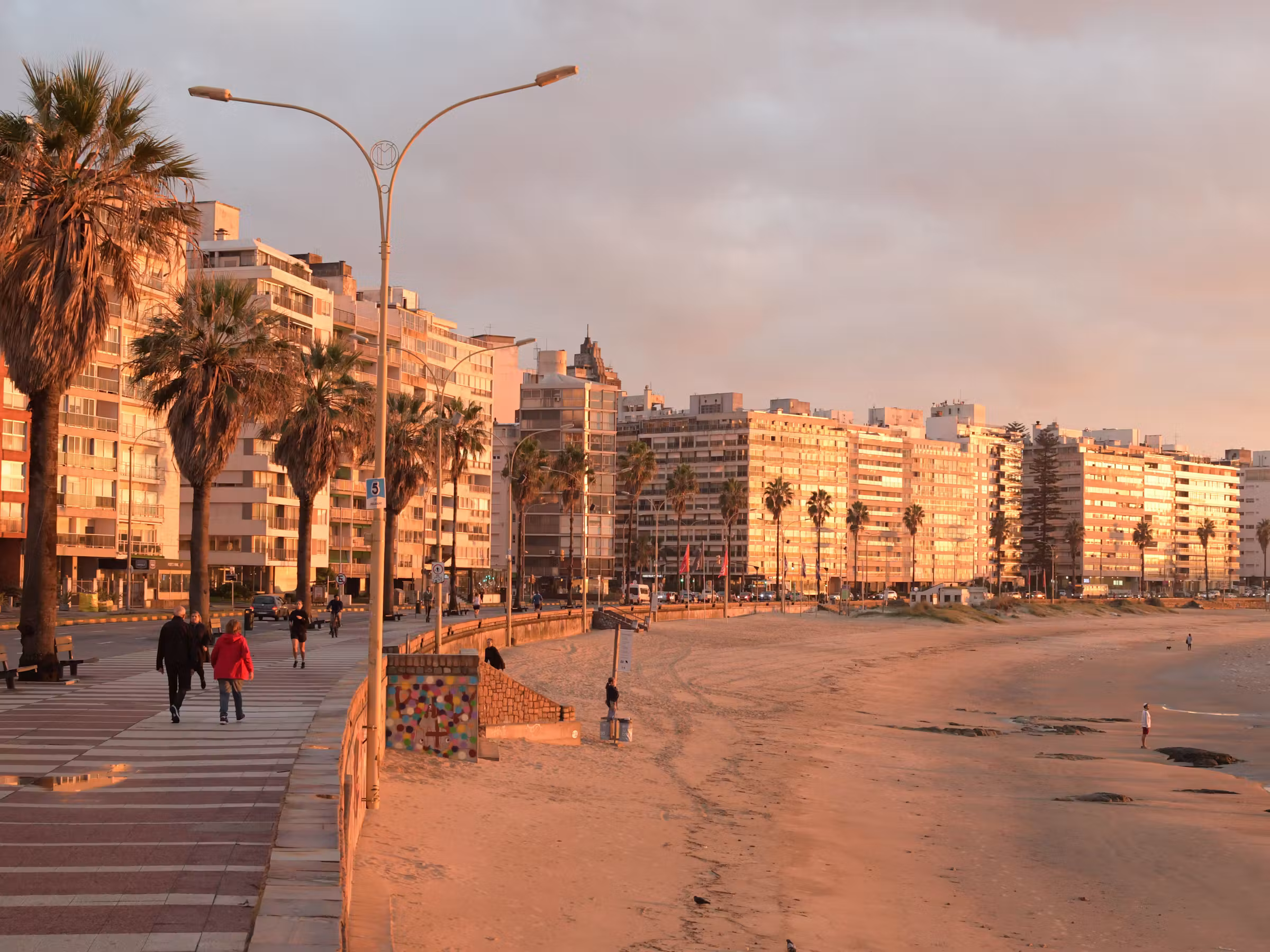 The Rambla waterfront promenade in Montevideo, Uruguay at sunset