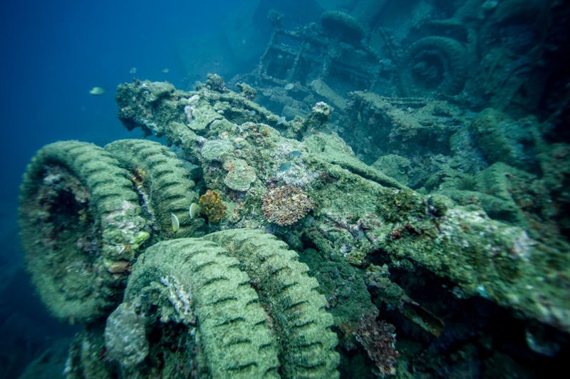WWII-era trucks and machinery visible underwater at Million Dollar Point, Espiritu Santo, Vanuatu